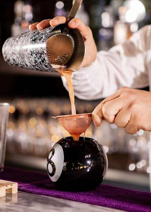 bartender-bartender-is-pouring-a-drink.jpg
